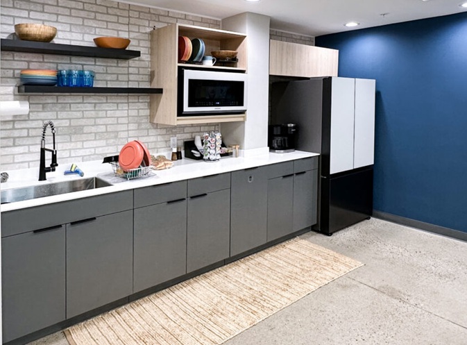 Office common area and workspace buildout with modern finishes