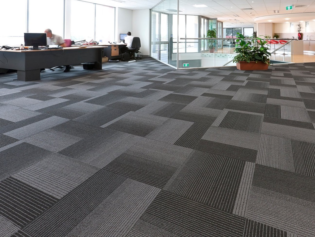 Commercial flooring installation during a tenant buildout