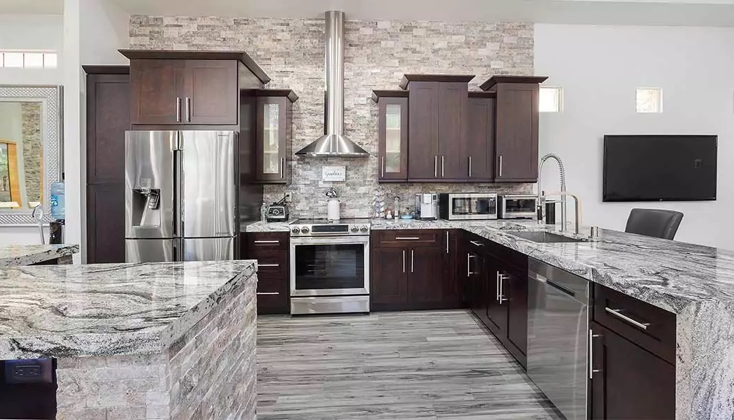 Bright residential kitchen renovation with updated cabinetry and finishes