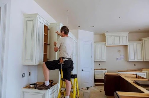 Kitchen remodeling project with updated cabinetry and counters
