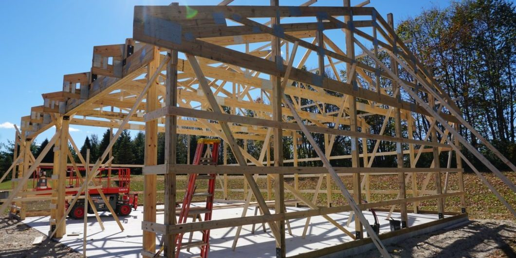 Ground-up post-frame structure framing on a new construction project