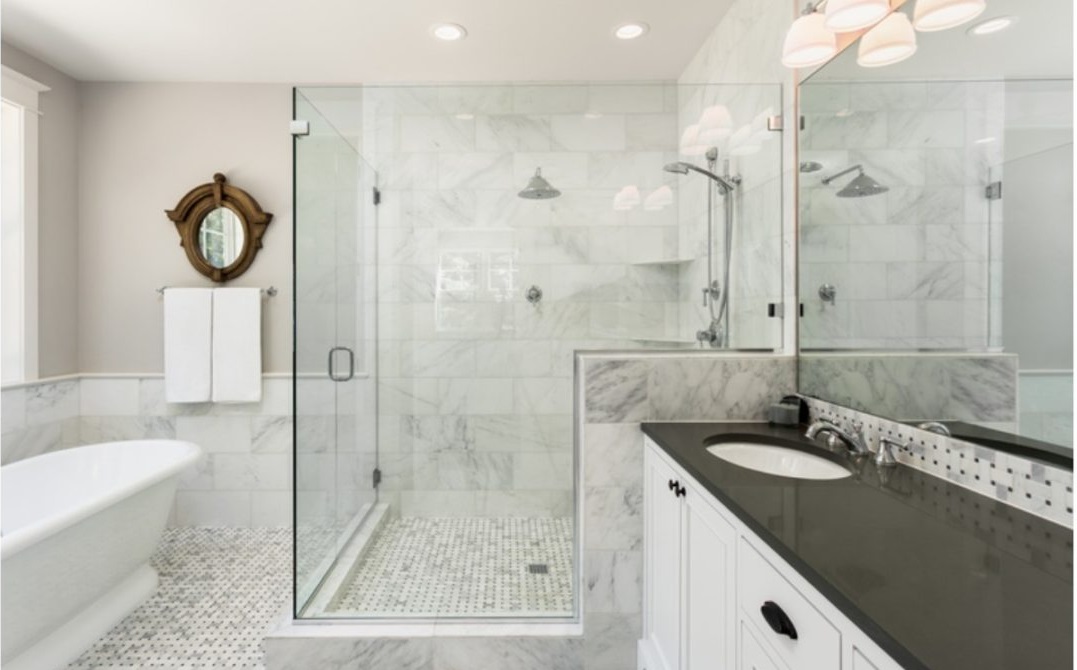 Fully tiled bathroom remodel with modern fixtures and finishes