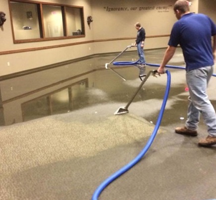Emergency water extraction and storm damage mitigation equipment on site